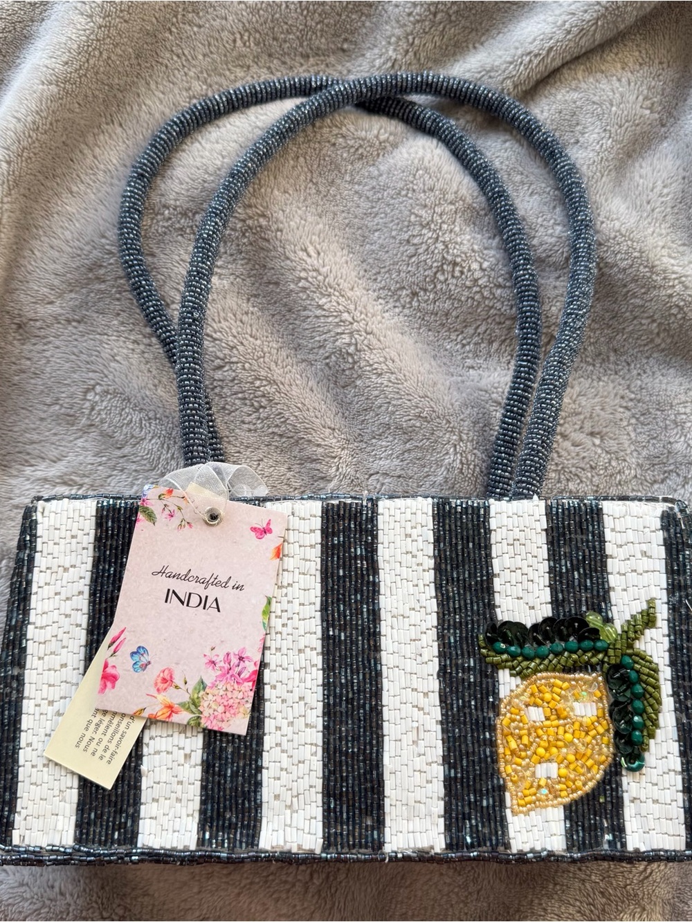 blue and white striped beaded purse with lemon design
